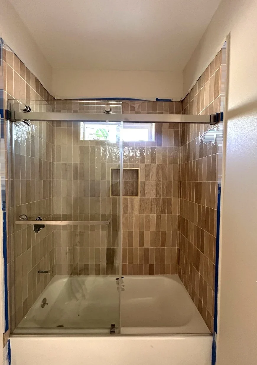 Complete double sliding bathtub shower door installation in Chino California
